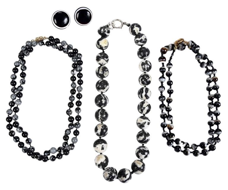 Three gemstone necklaces and earrings