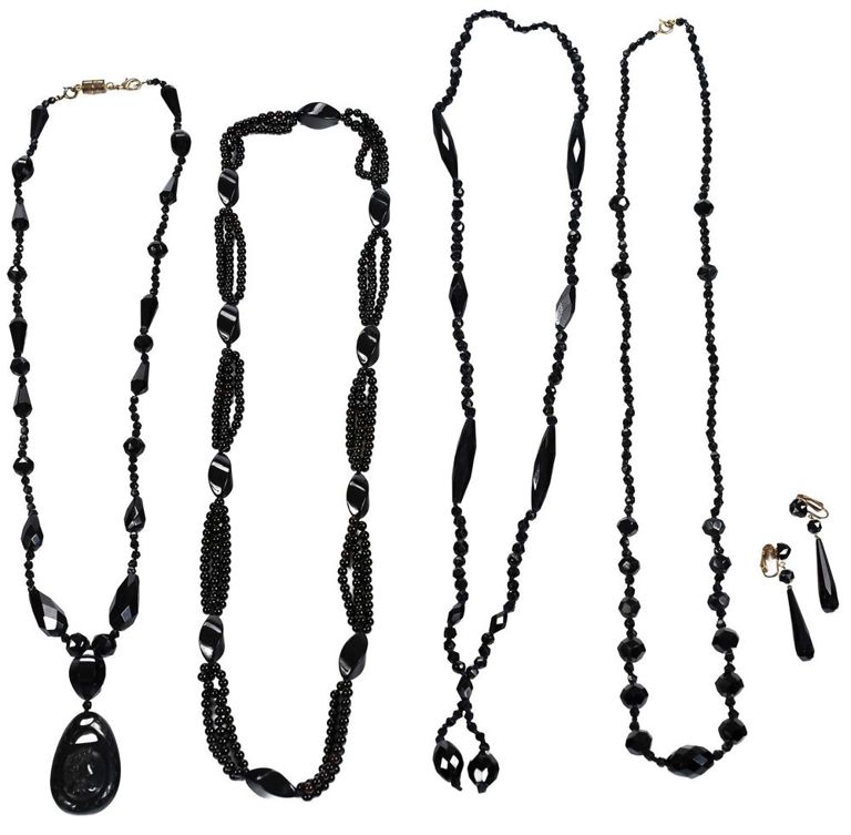 Four mourning necklaces and pair of earrings