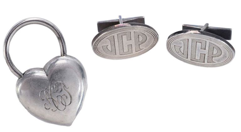 Tiffany & Co. sterling keychain and cufflinks with bags