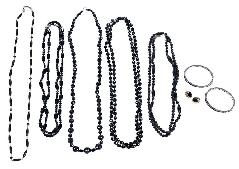 Five beaded necklaces, two bracelets, and a pair of earrings