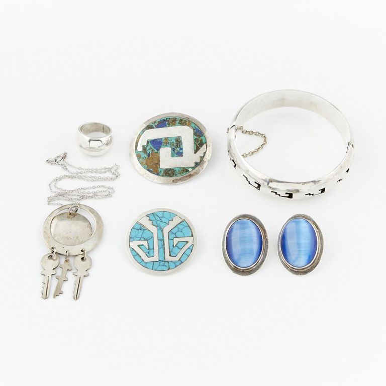 Group of six Mexican silver jewelry pieces