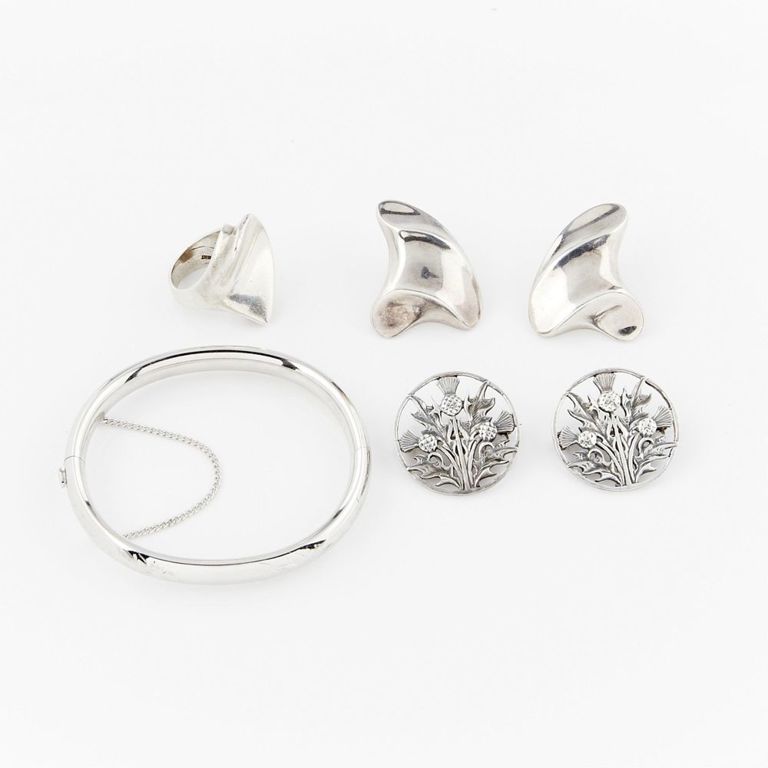 Group of four sterling silver jewelry pieces