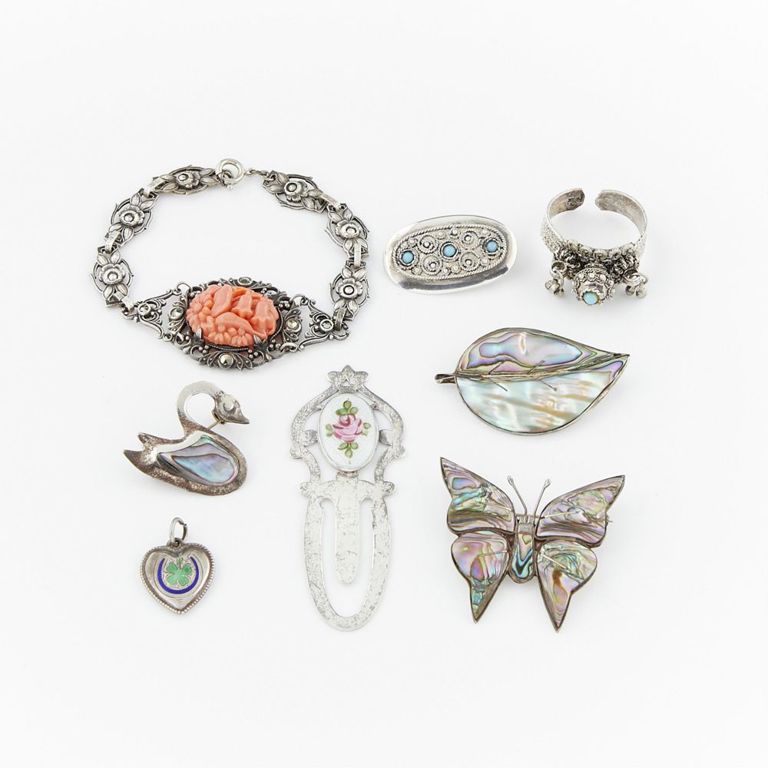Group of eight pieces of sterling silver jewelry