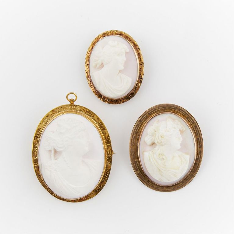 Group of three 10k yellow gold pink conch cameo brooches