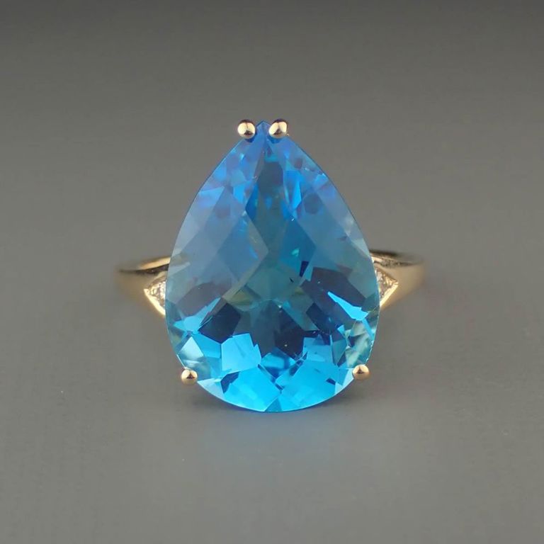 Blue topaz, diamond and 14k yellow gold ring