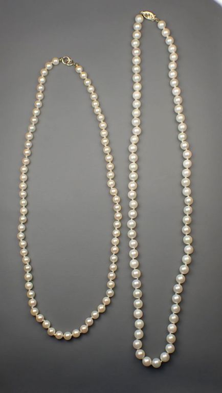 Two cultured pearl and 14k gold necklaces
