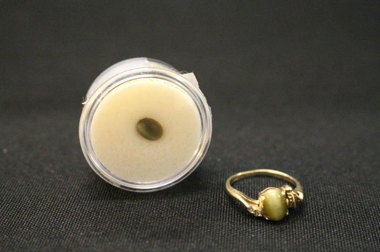 Cat's eye and 14k gold ring with unset cat's eye gem