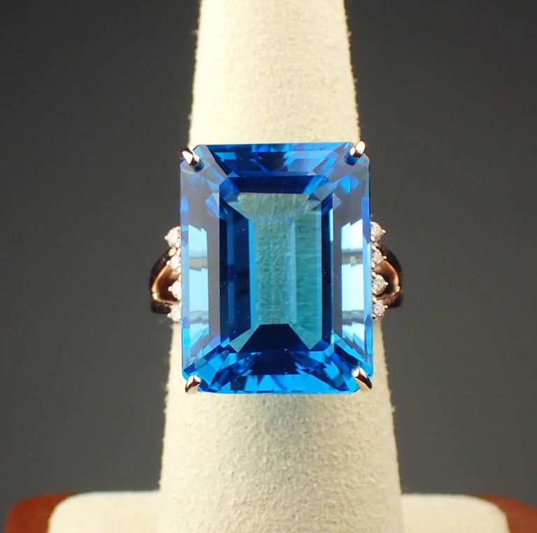 14k rose gold ring with blue topaz and diamonds