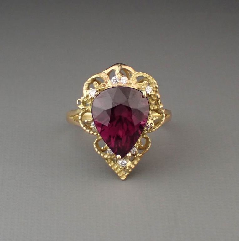 14k yellow gold ring with rhodolite and diamonds