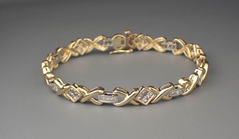 Diamond and 14k gold bracelet with appraisal