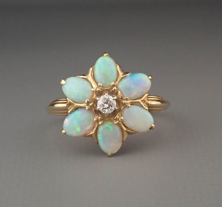 Opal, diamond and 14k yellow gold ring