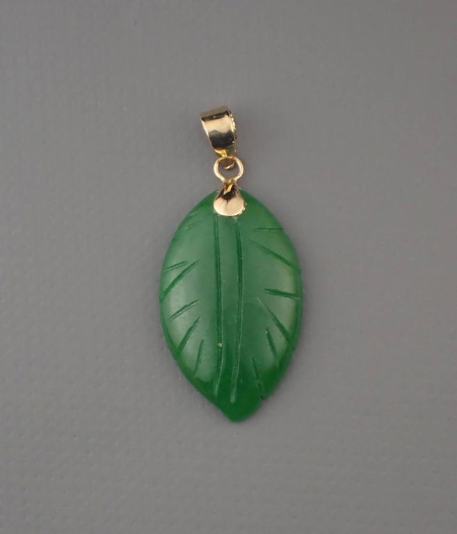 Jade and 14k gold pendant