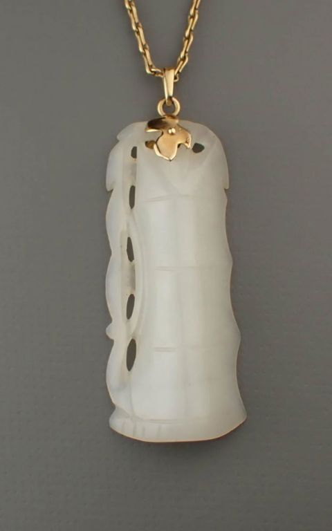 White jade and 14k gold pendant necklace