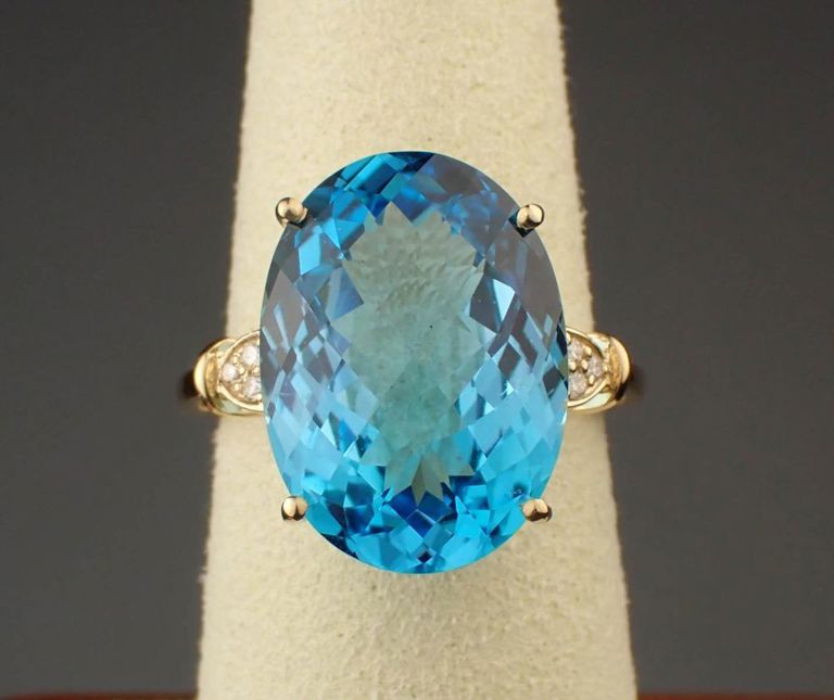 Blue topaz, diamond and 14k yellow gold ring
