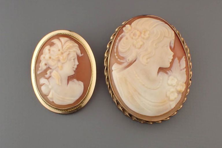 Two italian cameo and gold pendant/brooches