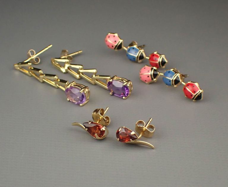 Three pairs of 14k gold earrings