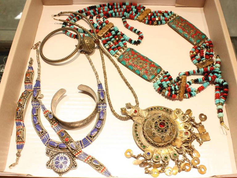 Tray of jewelry: necklaces and bracelets