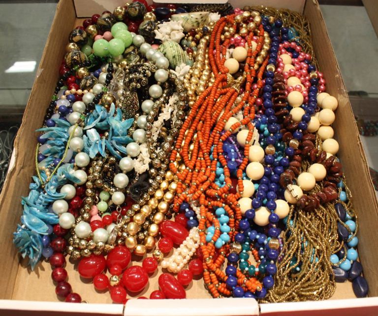 Tray of beaded necklaces