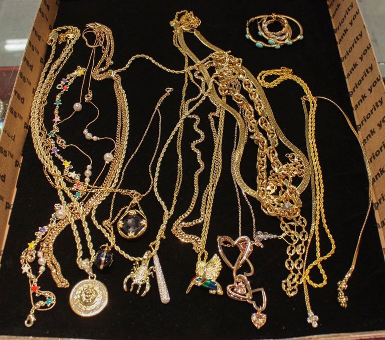 Tray of jewelry: necklaces and earrings