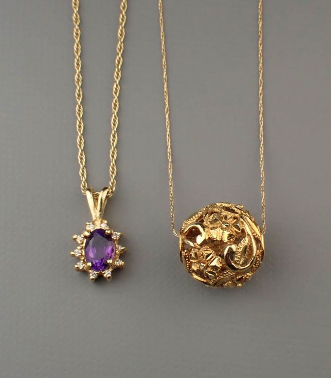 Two yellow gold pendant necklaces
