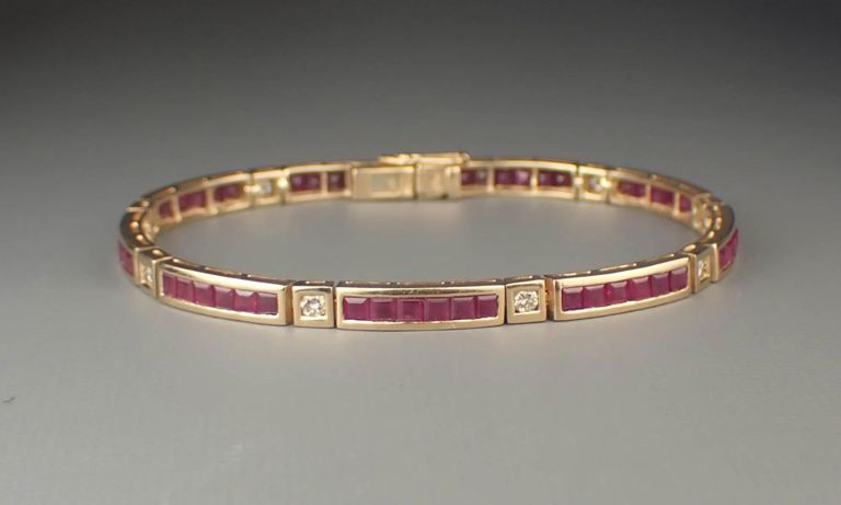 Ruby, diamond and 14k yellow gold bracelet