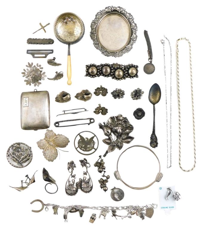 25+ pieces of silver jewelry and accessories