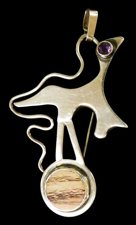 Sterling silver brooch/pendant with glass eye and stone perch