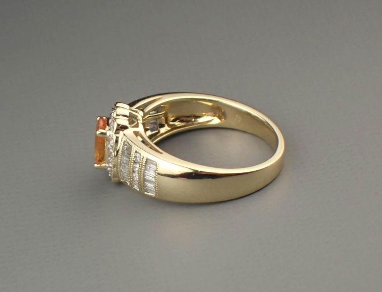 Spessartite, diamond, and 14k gold ring