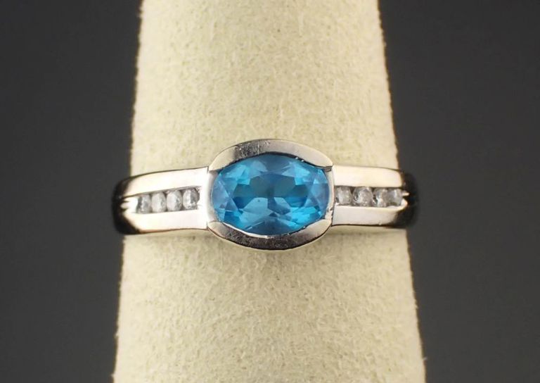 Blue topaz, diamond and 14k white gold ring
