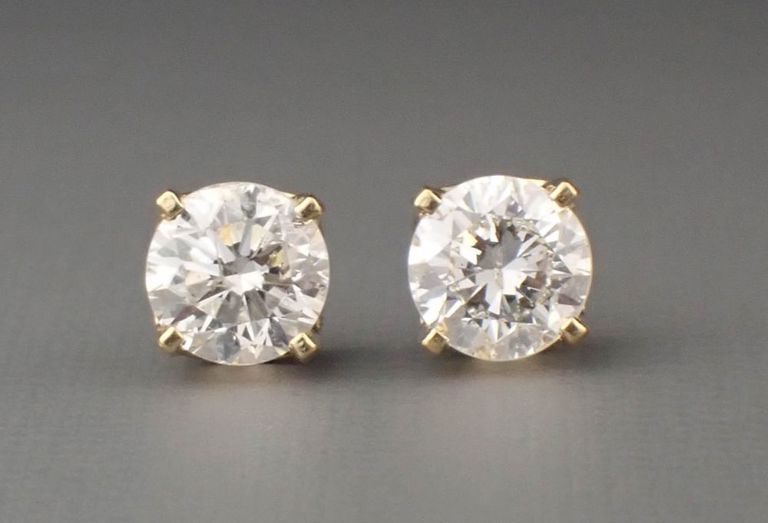 Diamond and 14k yellow gold ear studs