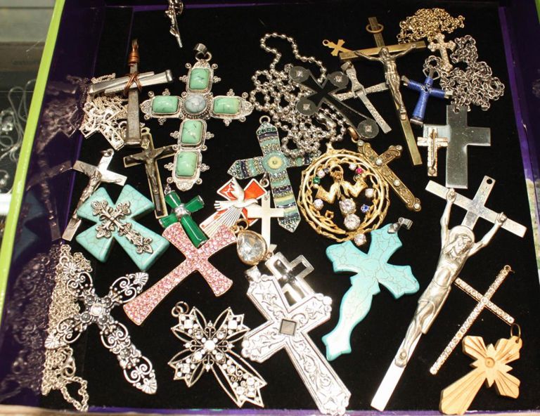 Tray of crucifix pendants