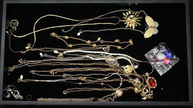 Tray of necklaces and earrings