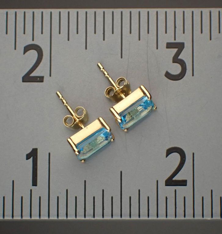 Blue topaz and 14k yellow gold ear studs