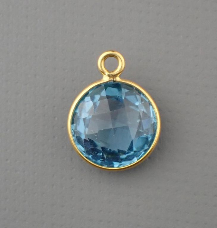 Blue topaz and 14k yellow gold pendant