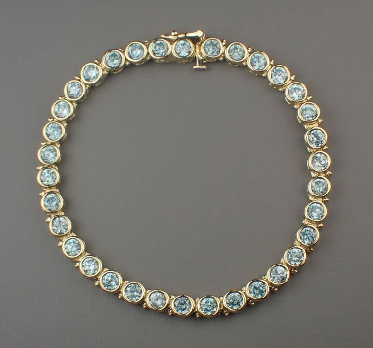 Blue zircon and 14k yellow gold bracelet