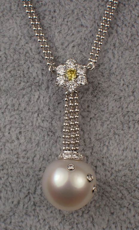 South Sea pearl, diamond and 18k gold earrings