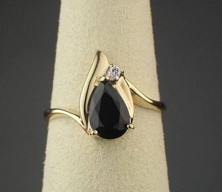 Black onyx, diamond and 14k gold ring
