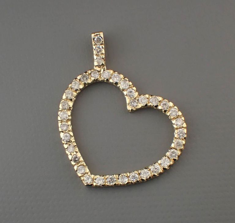 Diamond and 14k yellow gold pendant
