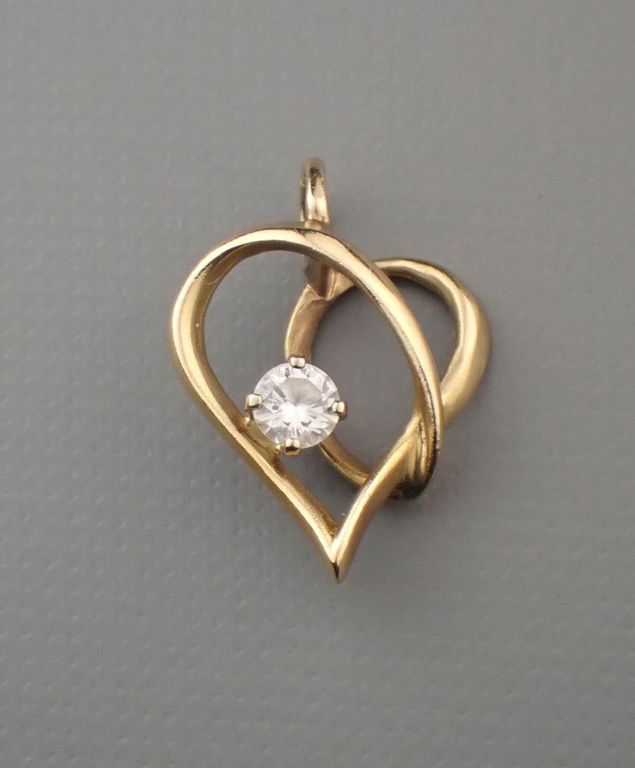 Diamond and 14k gold pendant