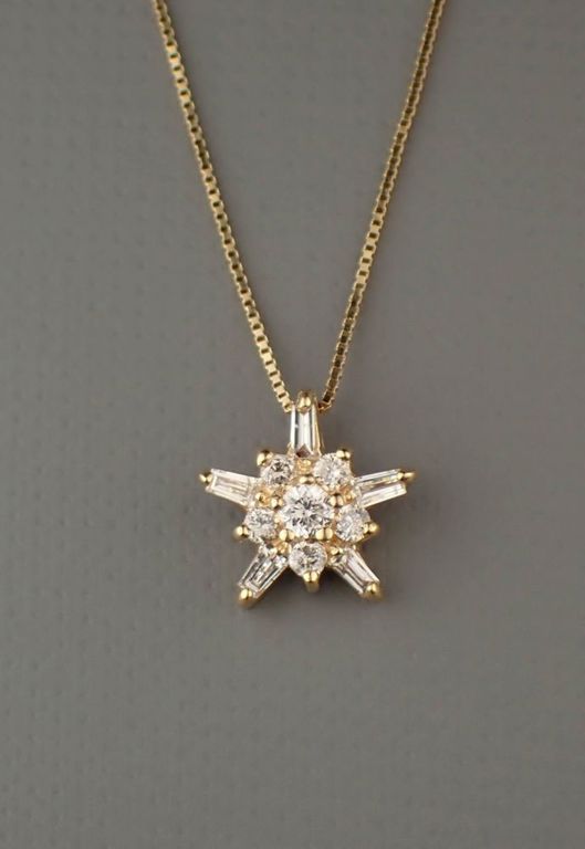 Diamond and 14k gold pendant necklace