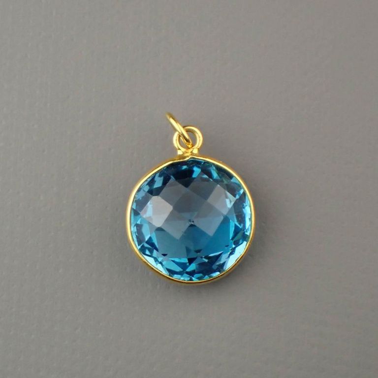 Blue topaz and 18k yellow gold charm/pendant