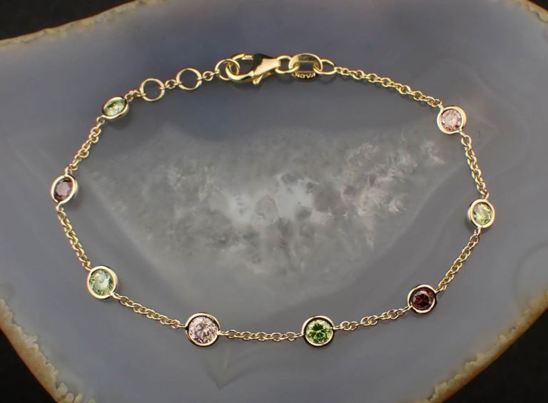 14k yellow gold fancy color diamond station bracelet
