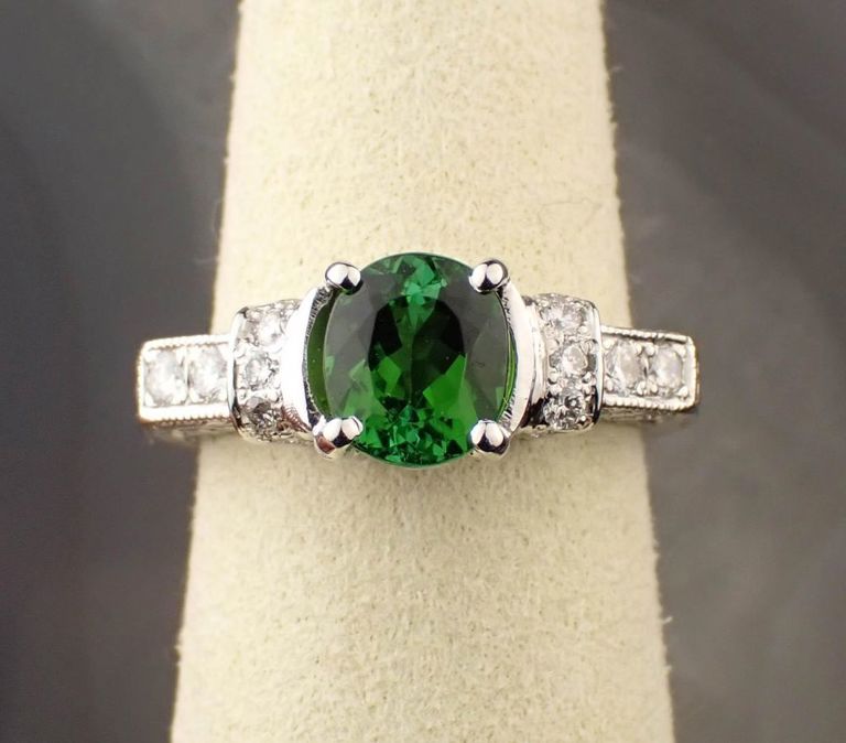 Platinum ring with green tourmaline and diamonds