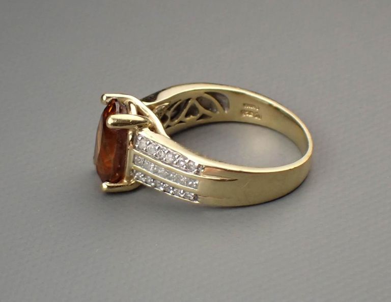 14k yellow gold ring with spessartite and diamonds