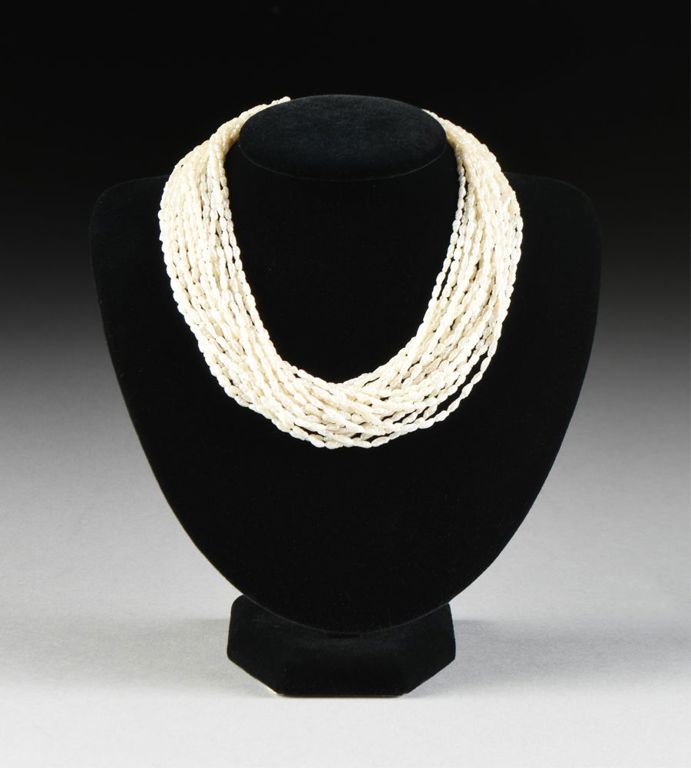 A 14k yellow gold twenty strand Keshi pearl necklace