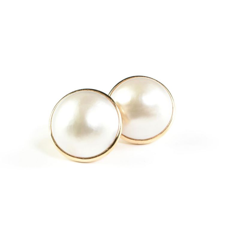 A pair of 14k yellow gold and mabe pearl earrings