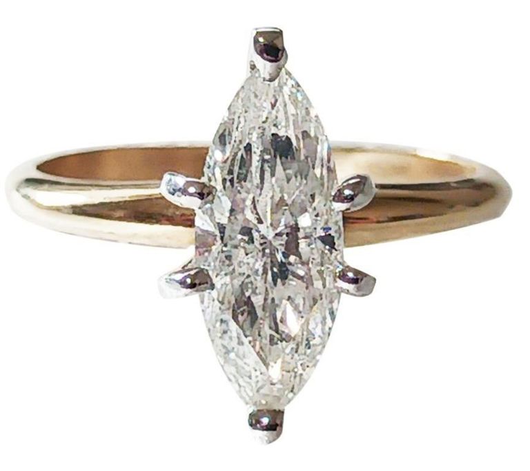 Lady's diamond solitaire 14k ring