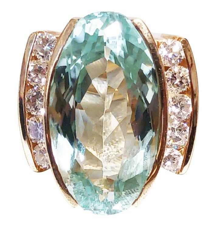 Lady's 20 ct aquamarine with 1.50 cts diamond ring