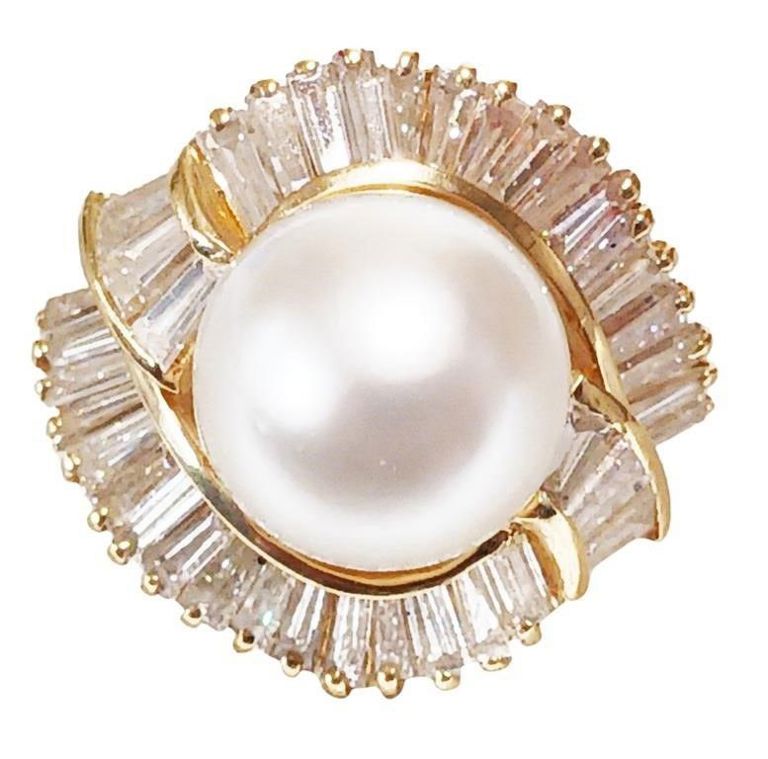 Lady's 3.46 cts diamond ring with 12 mm pearl