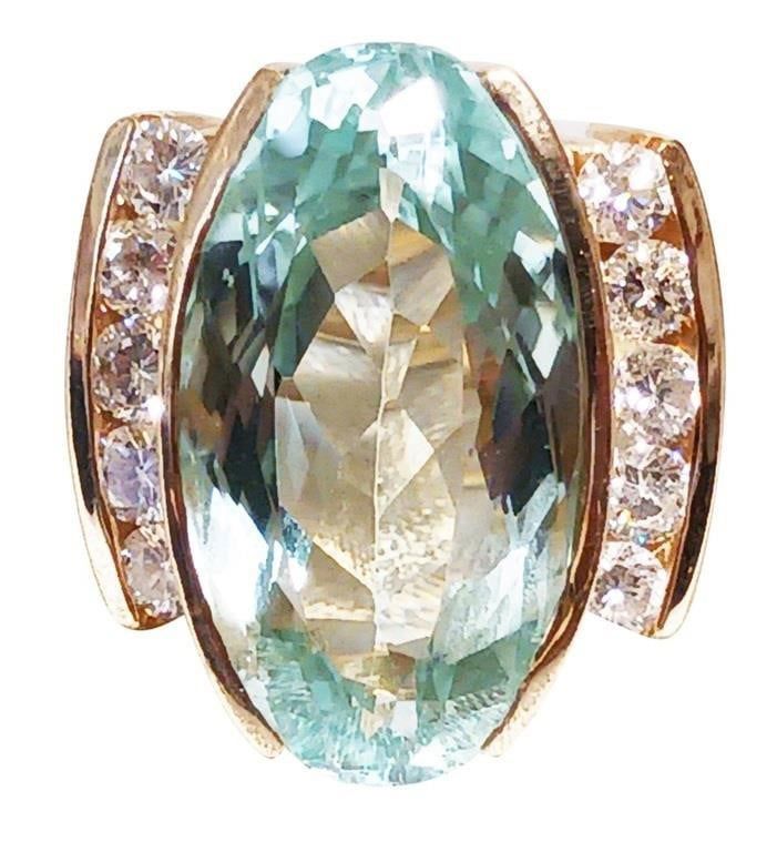 Lady's 20 ct aquamarine with 1.50 cts diamond ring
